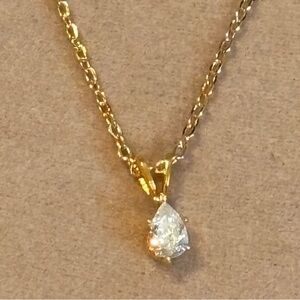 Gold Tone Necklace with Cubic Zirconia Teardrop Pendant